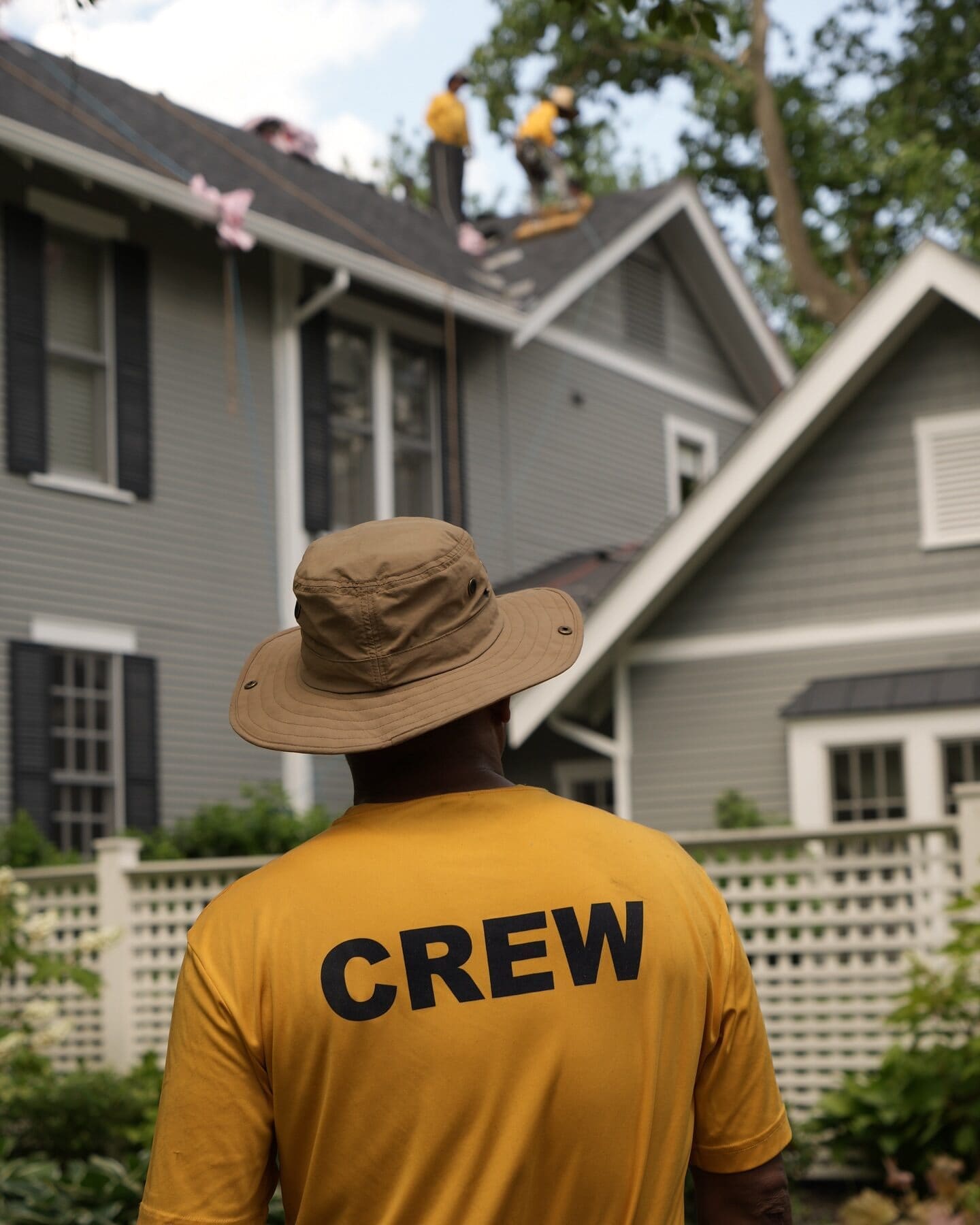 Rooftop Relief crew member supervising a roof replacement on an Oakley Cincinnati home